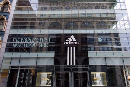 Adidas lifts outlook after beating 2015 